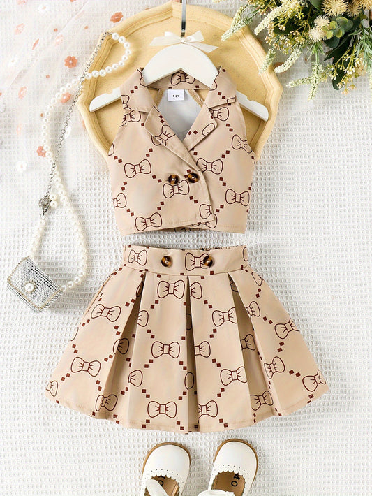 Two-piece set of a fashionable bow-knot printed sleeveless vest and a pleated skirt for girls in summer